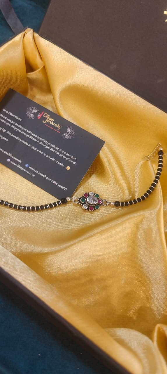 925 Silver Unisex Nazariya Rakhi/ Bracelet (Oval Emerald Flower) RAK002853