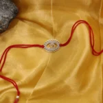 925 Silver Om Oval Rakhi RAK000065