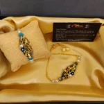 Embossed Floral Blue Thread Rakhi with matching Lumba Set