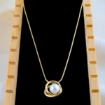Eterna Knot Pendant (Yellow Gold) NEC001730