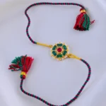 Kundan Kiran Red Green Rakhi (Yellow Gold) RAK001942