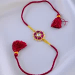 Kundan Kiran Ruby Red Thread Rakhi (Yellow Gold) RAK001944