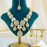 Royal Kundan Polki Necklace Set with Maang Tikka (Yellow Gold) NEC001576