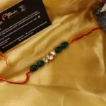 Triple Kundan Emerald Rakhi