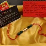 Triple Kundan Emerald Rakhi - Image 2