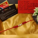 Triple Kundan Ruby Rakhi