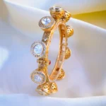 Uncut Polki Fusion Pacheli Bangle (Antique Gold) BRA001064